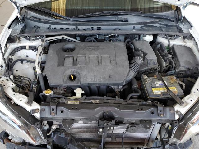 Photo 11 from auction – 2014 TOYOTA COROLLA L with VIN 5YFBURHE0EP108987