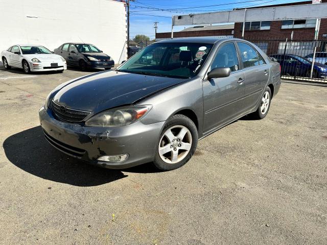Photo 2 from auction – 2002 TOYOTA CAMRY LE with VIN JTDBE32K320058391