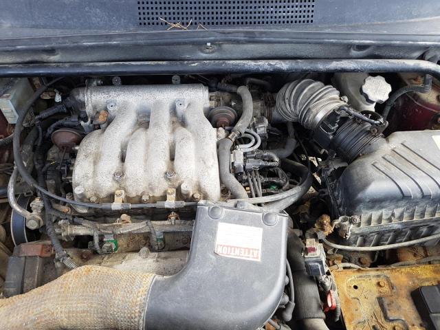 Photo 12 from auction – 2005 HYUNDAI TUCSON GL with VIN KM8JM72D85U114258