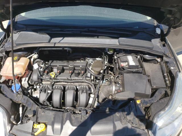 Photo 11 from auction – 2014 FORD FOCUS SE with VIN 1FADP3F24EL429497