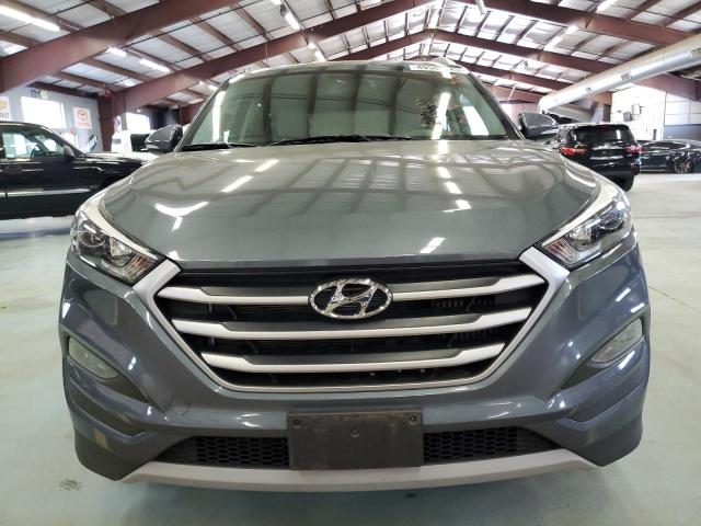 Photo 5 from auction – 2017 HYUNDAI TUCSON LIM with VIN KM8J3CA26HU460616