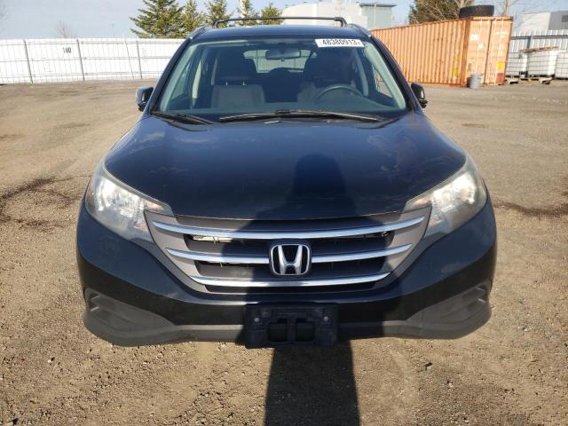 Photo 5 from auction – 2014 HONDA CR-V LX with VIN 2HKRM3H31EH004841