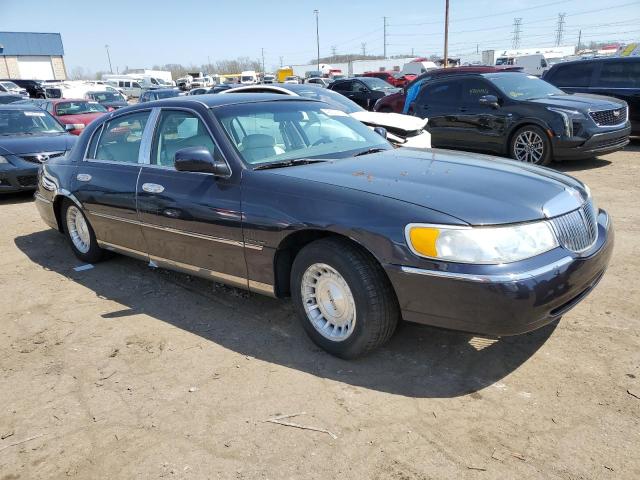 Photo 4 from auction – 1999 LINCOLN TOWN CAR E with VIN 1LNHM81W7XY669205
