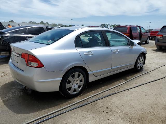 Photo 3 from auction – 2011 HONDA CIVIC LX with VIN 19XFA1F53BE011066
