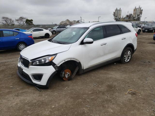 KIA SORENTO LX 2016 with VIN 5XYPG4A33GG149761 - Photo from auction
