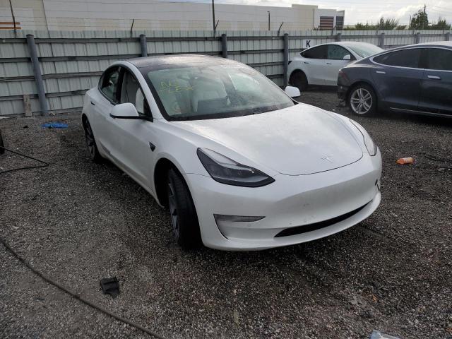 Photo 4 from auction – 2021 TESLA MODEL 3 with VIN 5YJ3E1EA4MF047755