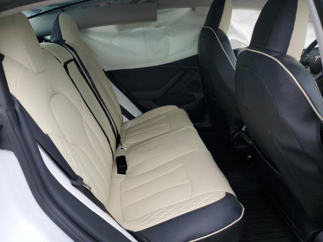 Photo 10 from auction – 2022 TESLA MODEL 3 with VIN 5YJ3E1EB0NF102339
