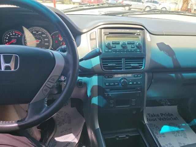 Photo 9 from auction – 2006 HONDA PILOT EX with VIN 5FNYF286X6B028209