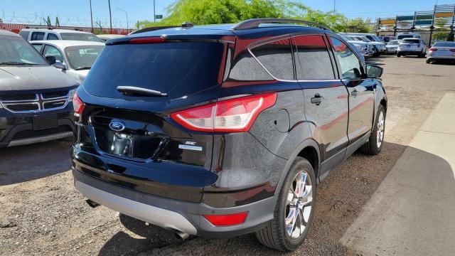 Photo 4 from auction – 2016 FORD ESCAPE SE with VIN 1FMCU0GX7GUA53586