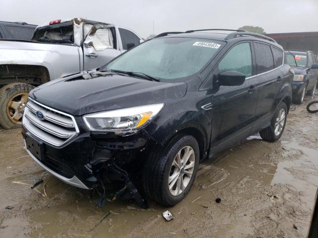 FORD ESCAPE SE 2018 with VIN 1FMCU0GD8JUC84283 - Photo from auction