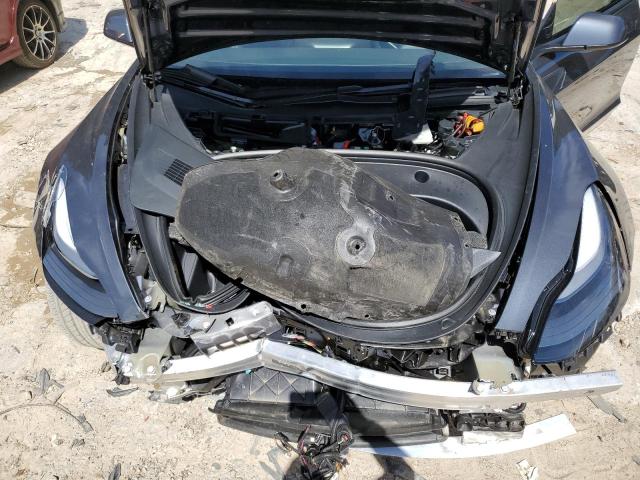 Photo 11 from auction – 2022 TESLA MODEL 3 with VIN 5YJ3E1EB6NF277419