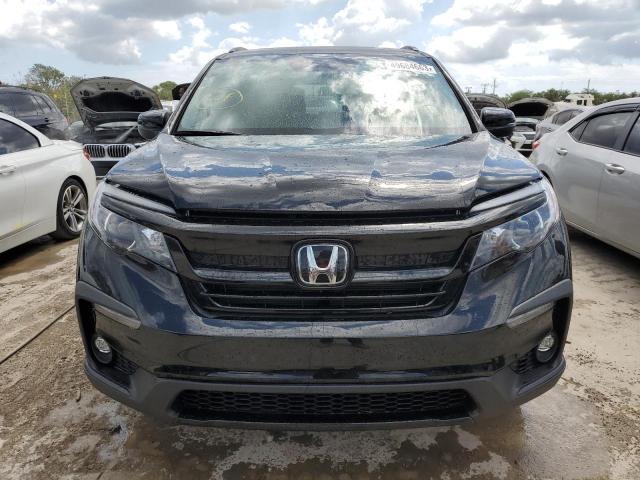 Photo 5 from auction – 2022 HONDA PILOT TRAI with VIN 5FNYF6H82NB045058