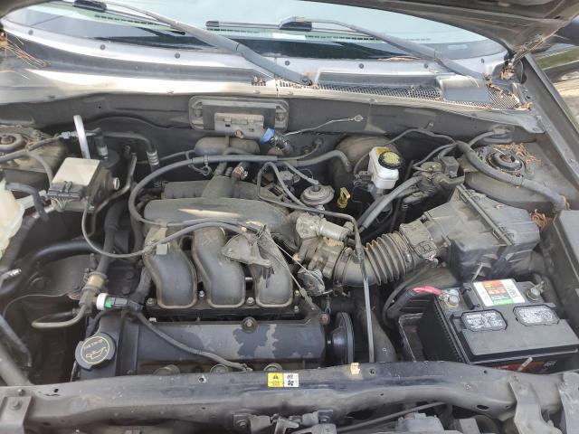 Photo 11 from auction – 2002 MAZDA TRIBUTE LX with VIN 4F2YU09142KM12769