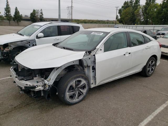 HONDA CIVIC LX 2020 with VIN 19XFC2F6XLE010703 - Photo from auction