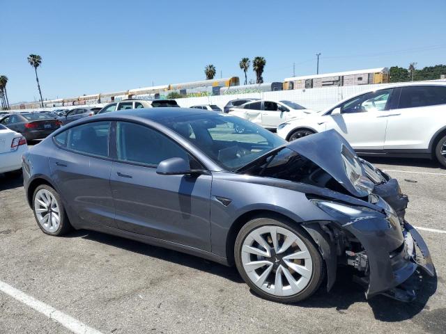 Photo 4 from auction – 2022 TESLA MODEL 3 with VIN 5YJ3E1EBXNF143562