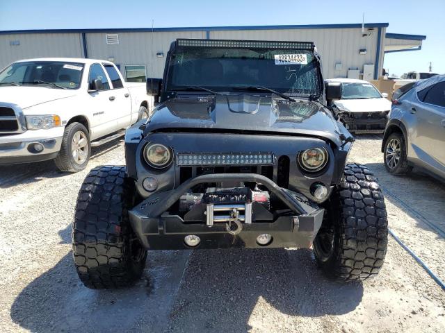 Photo 5 from auction – 2016 JEEP WRANGLER U with VIN 1C4BJWDG9GL256792