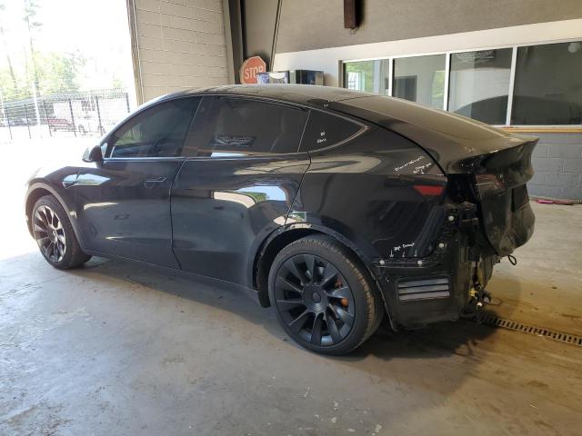 Photo 2 from auction – 2021 TESLA MODEL Y with VIN 5YJYGDED0MF115190