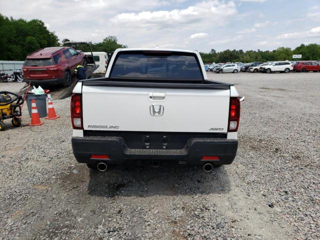 Photo 6 from auction – 2023 HONDA RIDGELINE with VIN 5FPYK3F74PB007782