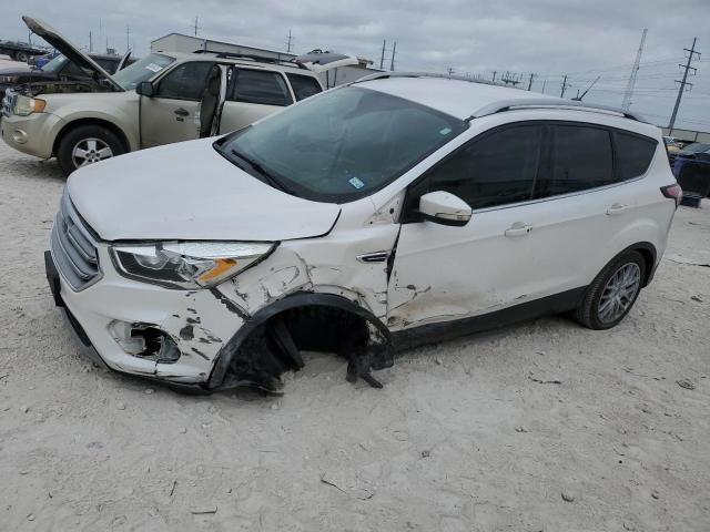 FORD ESCAPE TIT 2017 with VIN 1FMCU0J91HUD58576 - Photo from auction