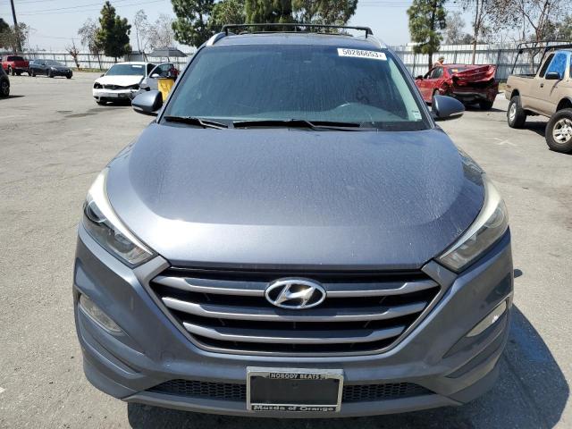 Photo 5 from auction – 2016 HYUNDAI TUCSON LIM with VIN KM8J33A24GU027214