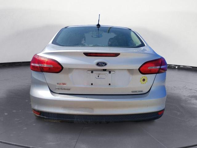 Photo 6 from auction – 2015 FORD FOCUS S with VIN 1FADP3E28FL338610