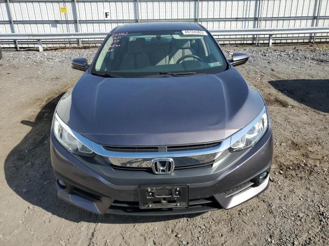 Photo 5 from auction – 2018 HONDA CIVIC EX with VIN 19XFC1F39JE200327