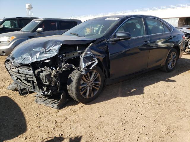 TOYOTA CAMRY LE 2017 with VIN 4T1BF1FK7HU795036 - Photo from auction