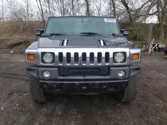 Foto 5 de la subasta – 2003 HUMMER H2 con VIN 5GRGN23U13H111235
