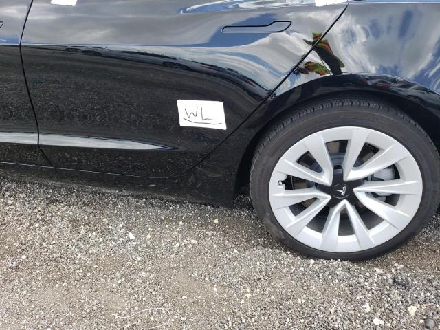 Photo 12 from auction – 2022 TESLA MODEL 3 with VIN 5YJ3E1EB4NF204047