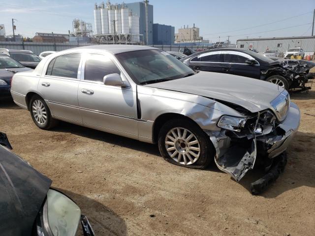 Photo 4 from auction – 2004 LINCOLN TOWN CAR E with VIN 1LNHM81W04Y627079