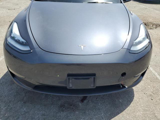 Photo 12 from auction – 2022 TESLA MODEL Y with VIN 7SAYGDEE8NF353334