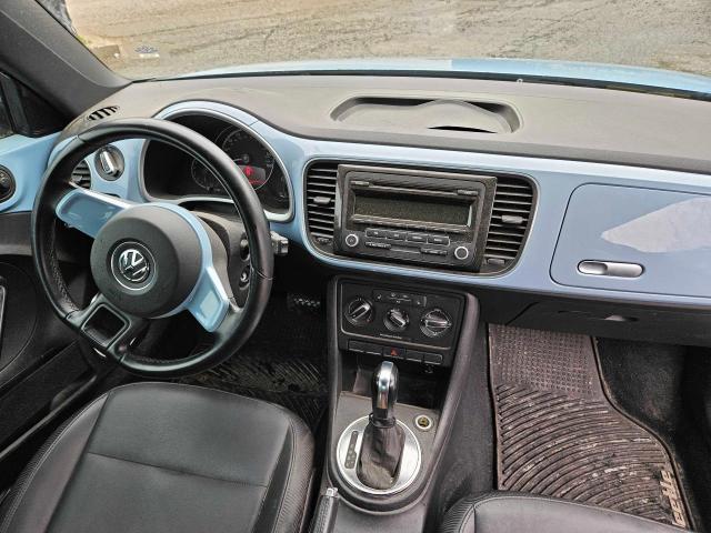 Photo 9 from auction – 2013 VOLKSWAGEN BEETLE with VIN 3VWJX7AT4DM662276
