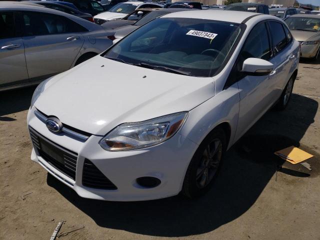 FORD FOCUS SE 2013 with VIN 1FADP3F22DL382677 - Photo from auction