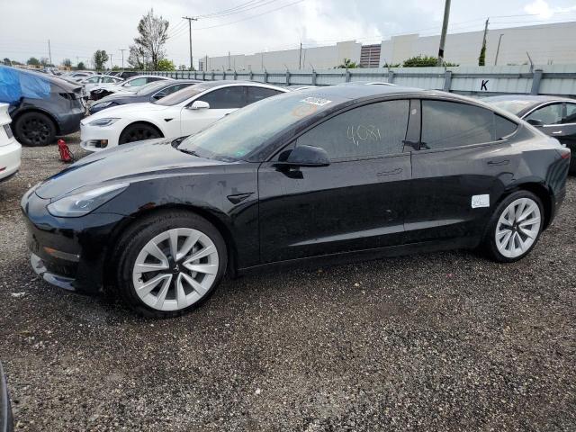 TESLA MODEL 3 2022 with VIN 5YJ3E1EB4NF204047 - Photo from auction