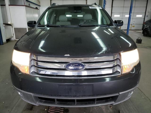 Photo 5 from auction – 2008 FORD TAURUS X S with VIN 1FMDK02W18GA20513