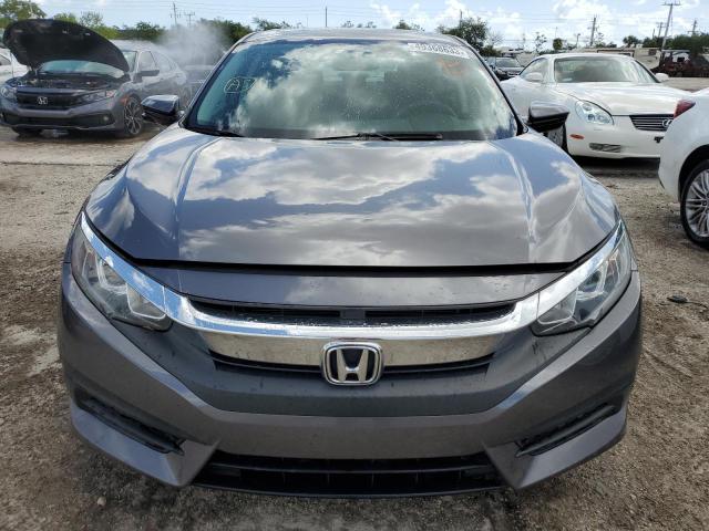 Photo 5 from auction – 2018 HONDA CIVIC EX with VIN 19XFC2F78JE010110