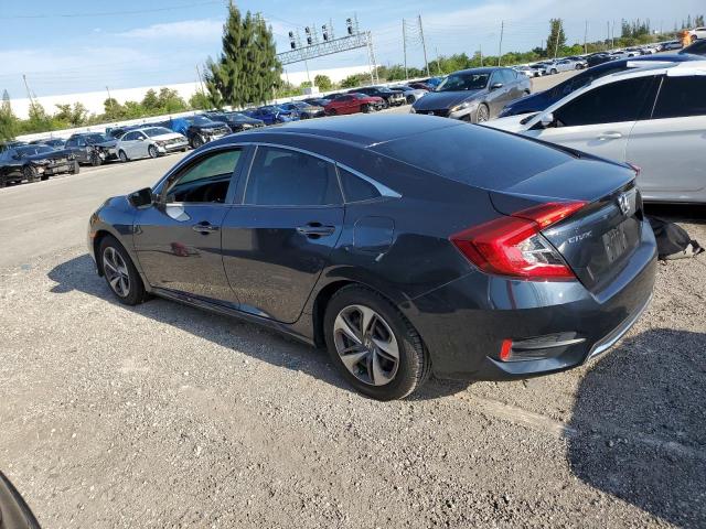 Photo 2 from auction – 2019 HONDA CIVIC LX with VIN 19XFC2F61KE038579