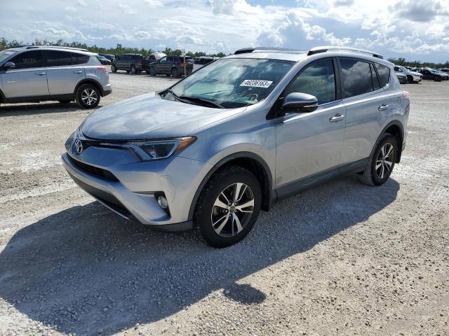 TOYOTA RAV4 XLE 2016 with VIN 2T3RFREV9GW447155 - Photo from auction