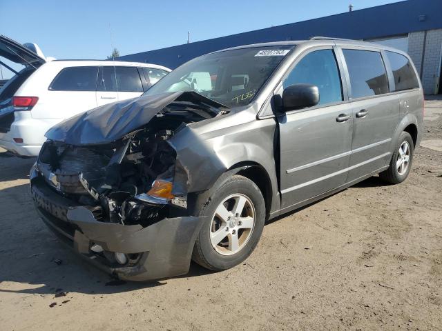 DODGE GRAND CARA 2010 with VIN 2D4RN5DX5AR216949 - Photo from auction