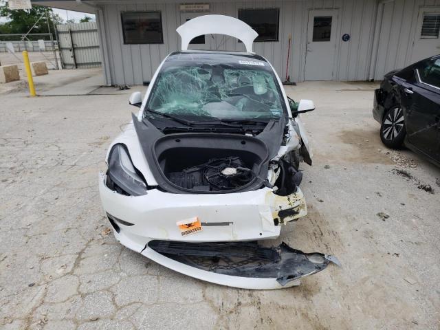 Photo 5 from auction – 2022 TESLA MODEL 3 with VIN 5YJ3E1EBXNF287547
