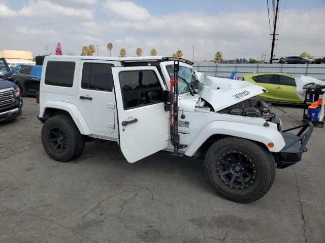 Photo 4 from auction – 2016 JEEP WRANGLER U with VIN 1C4BJWEG0GL268764