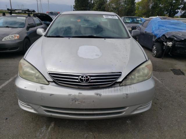 Photo 5 from auction – 2004 TOYOTA CAMRY LE with VIN 4T1BE32K24U851446
