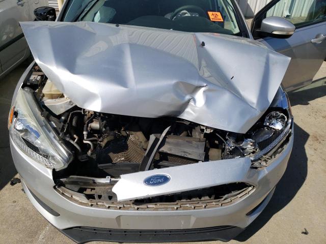 Photo 11 from auction – 2016 FORD FOCUS SE with VIN 1FADP3F29GL323761