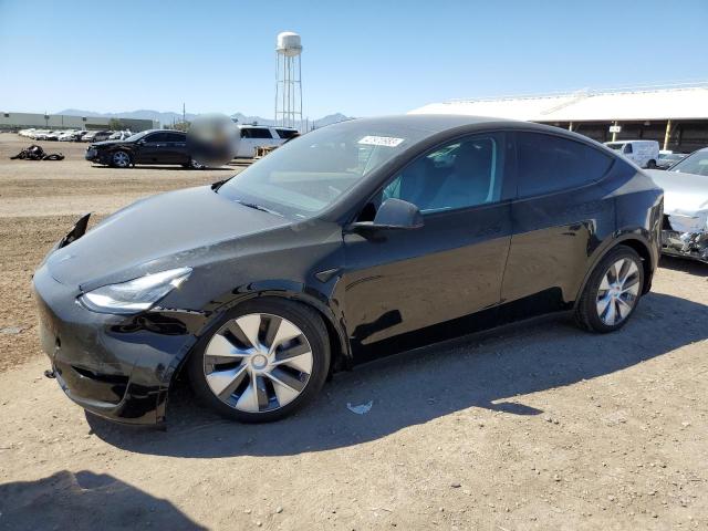 TESLA MODEL Y 2023 with VIN 7SAYGDEE3PF616249 - Photo from auction