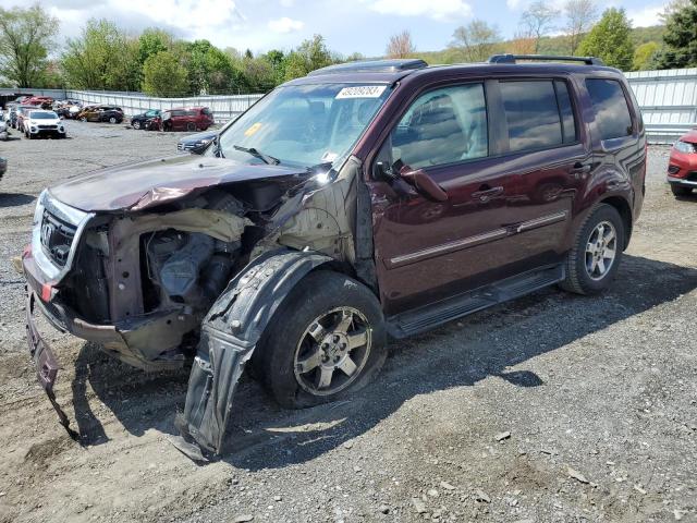 HONDA PILOT TOUR 2011 with VIN 5FNYF4H97BB072572 - Photo from auction