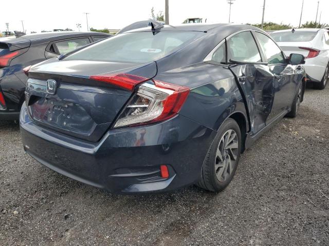 Photo 3 from auction – 2018 HONDA CIVIC EX with VIN 2HGFC2F76JH603051