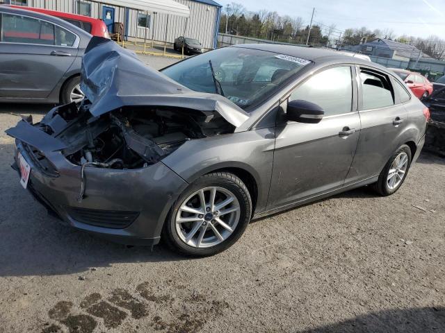 FORD FOCUS SE 2017 with VIN 1FADP3F25HL311575 - Photo from auction