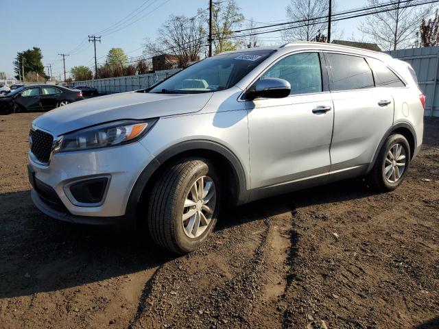 KIA SORENTO LX 2016 with VIN 5XYPG4A30GG065428 - Photo from auction