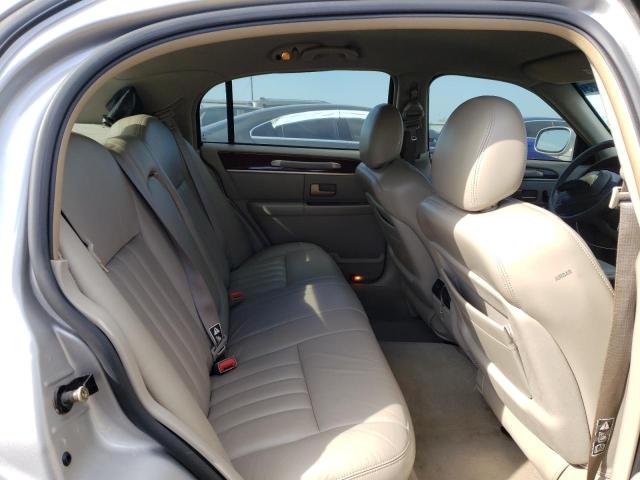 Photo 10 from auction – 2004 LINCOLN TOWN CAR E with VIN 1LNHM81W04Y627079