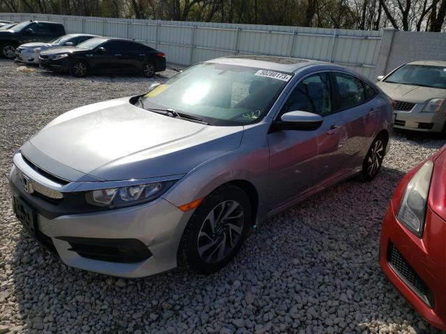 HONDA CIVIC EX 2018 with VIN 19XFC2F72JE026853 - Photo from auction